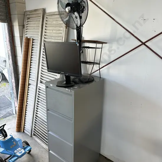 file, fan, monitor and table