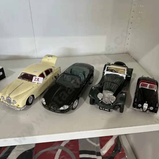 4 vintage model cars