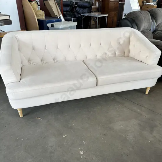 Very tidy Paulack button back sofa