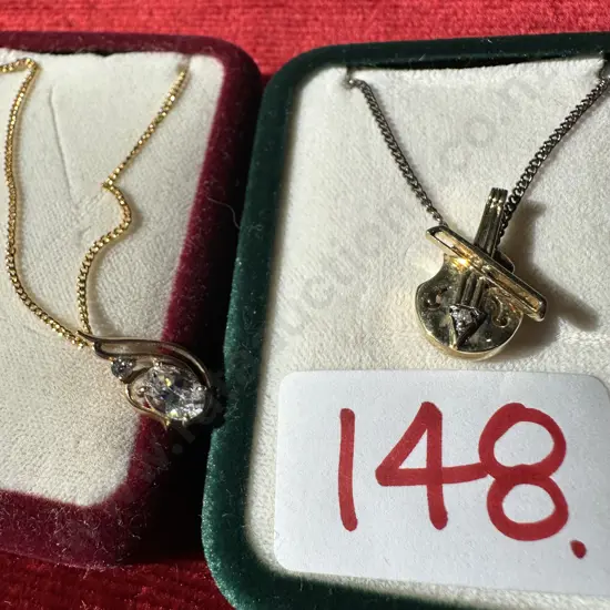 inscribed 375 musical pendant plus one other pendant