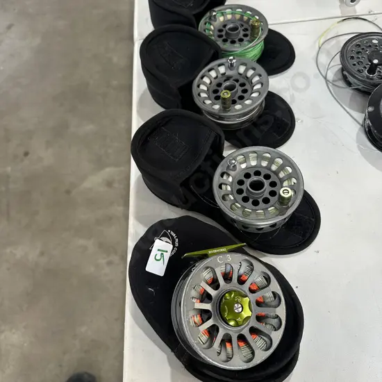 Riverworks C3 reel plus 3 extra spools & pouches