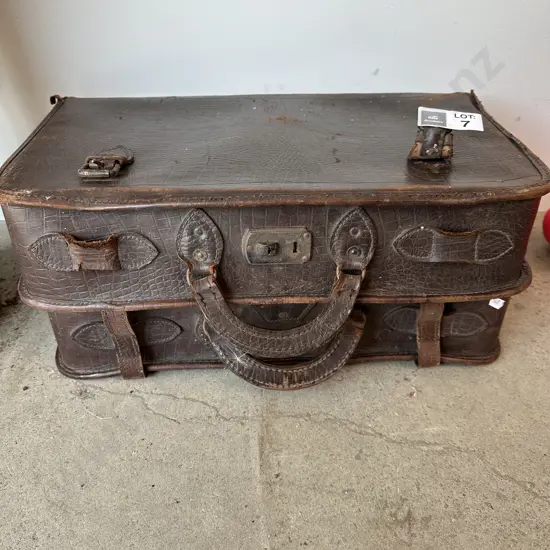 Alligator skin suitcase