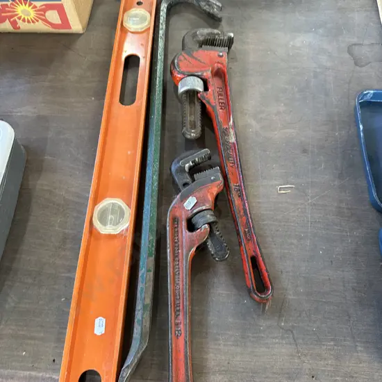 Wrenches, level, pinch bar