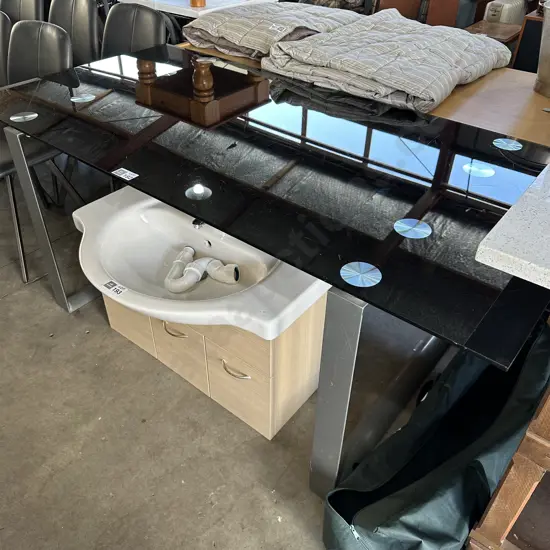 Black glass table (scratched)