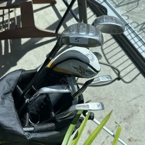 Wilson golf clubs and Adidas bag