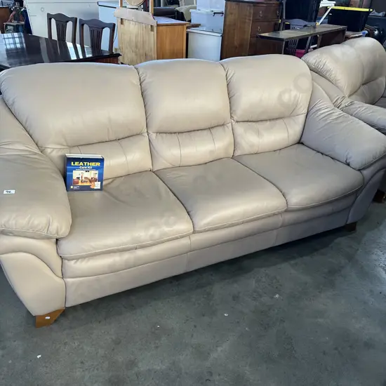 Very tidy  leather 3 & 2 seaters plus care kit