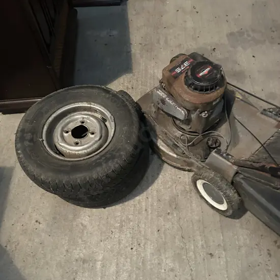 mower as is and pr of garden trailer wheels