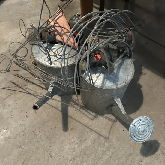 water cans and sprinkler gear etc