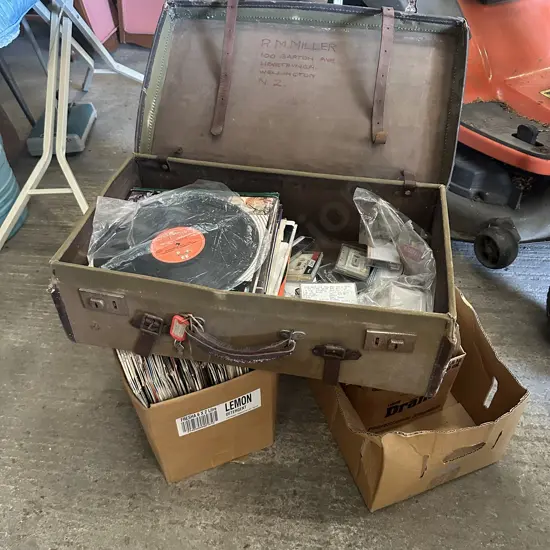 LPs plus suitcase