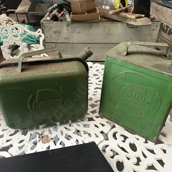 2 green castrol tins