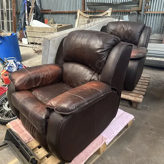 pr well used leather arm chairs