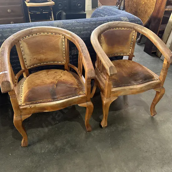 Pr distressed leather & Teak tub chairs