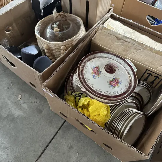 2 Boxes of dinnerware, headphones etc