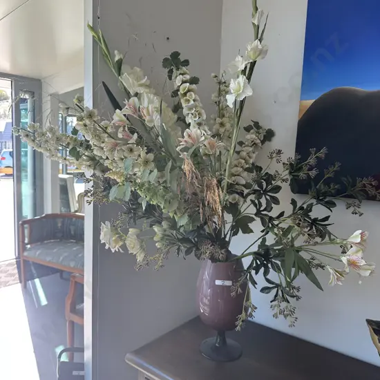 Glass vase with arrangement