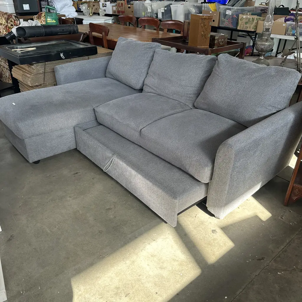 Pullout sofa bed plus storage Image 1++