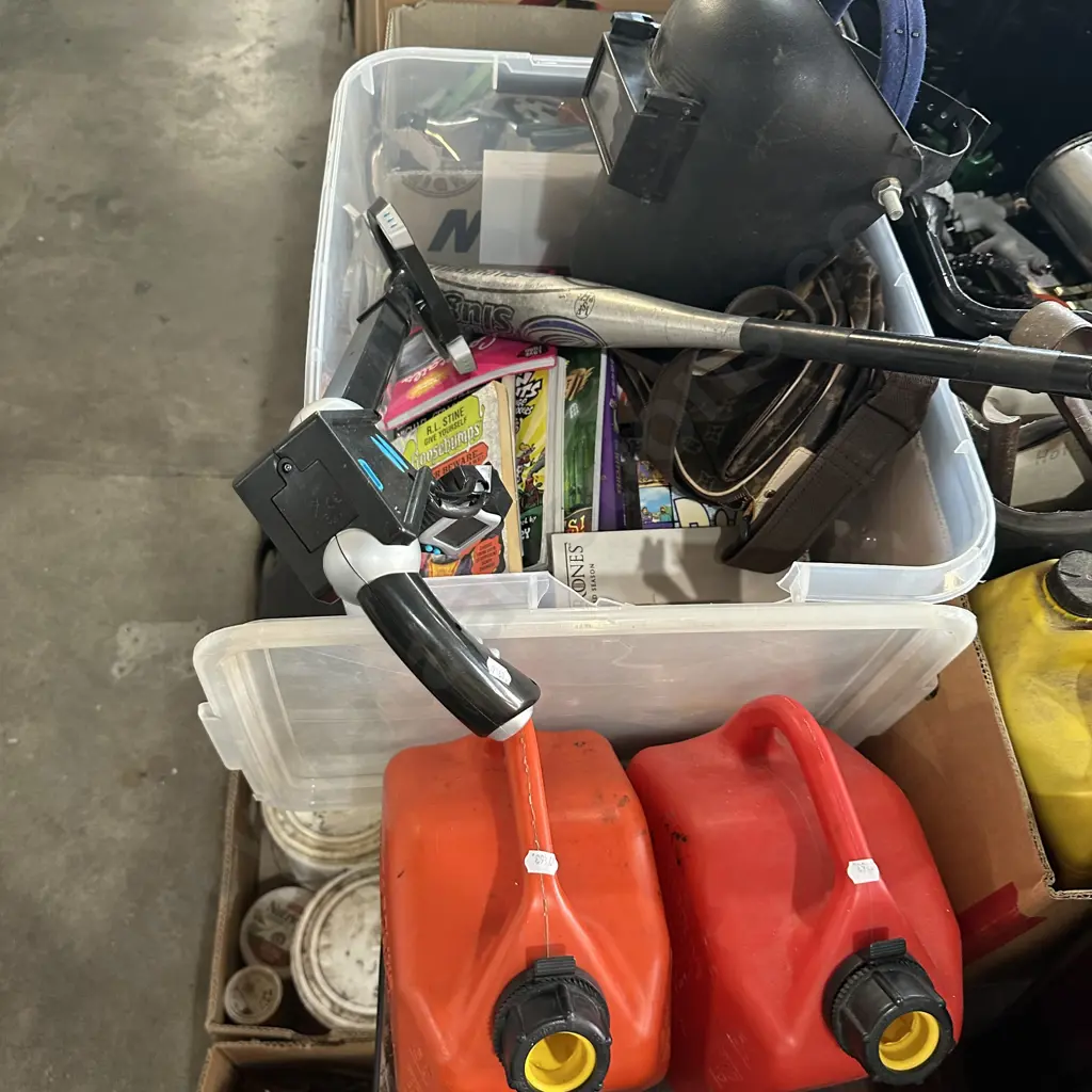 Bin of books, petrol cans, welding helmet etc. Image 1++