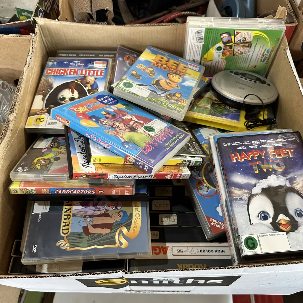 Box of VHS videos and DVDs etc. Image 1++