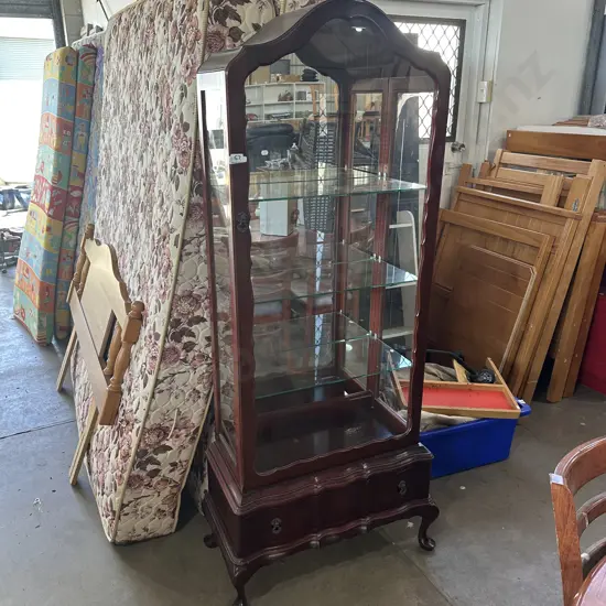1800 tall mahogany display case on Serpentine draw