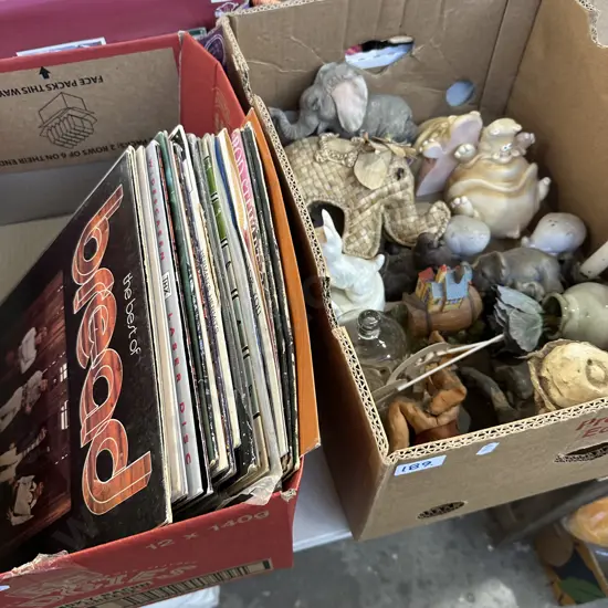 Two boxes records, elephants etc.