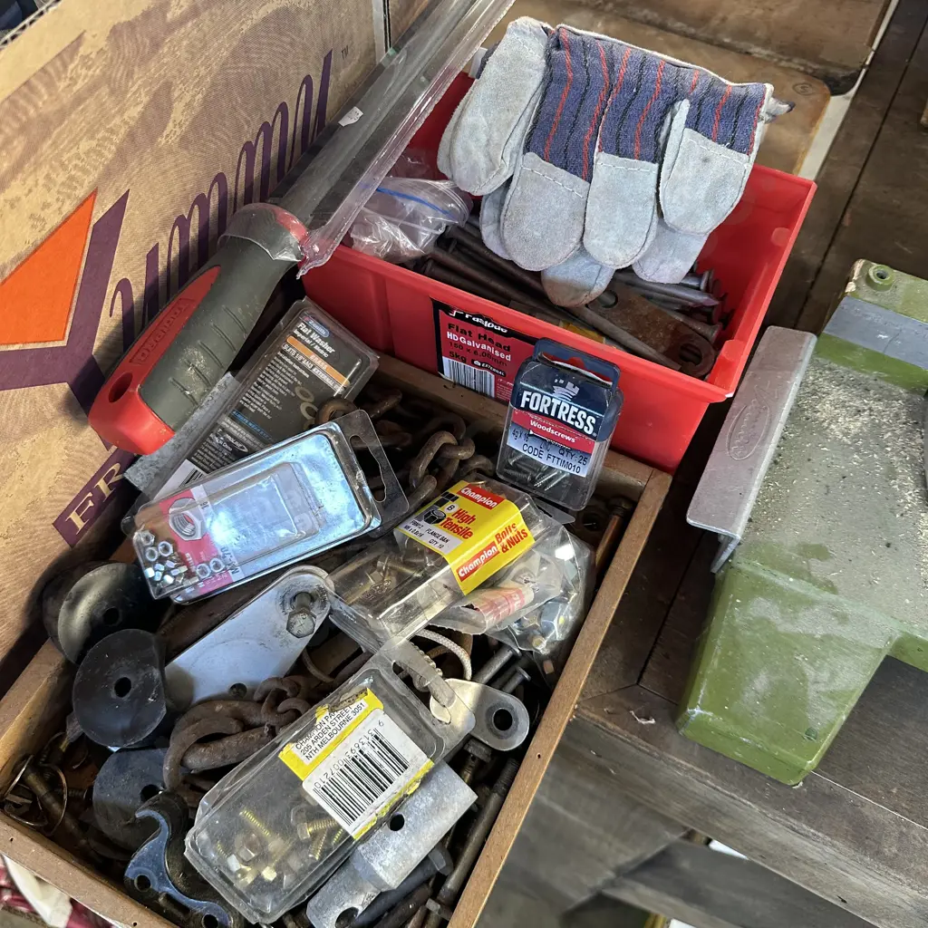 Six inch nails, new gloves and file, box of chain and hardware etc. Image 1++