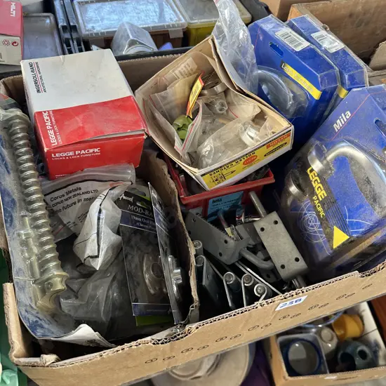 Box of hardware including new door handles, gate spring etc.