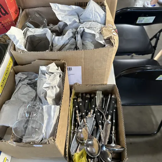 Three boxes cutlery and glassware.