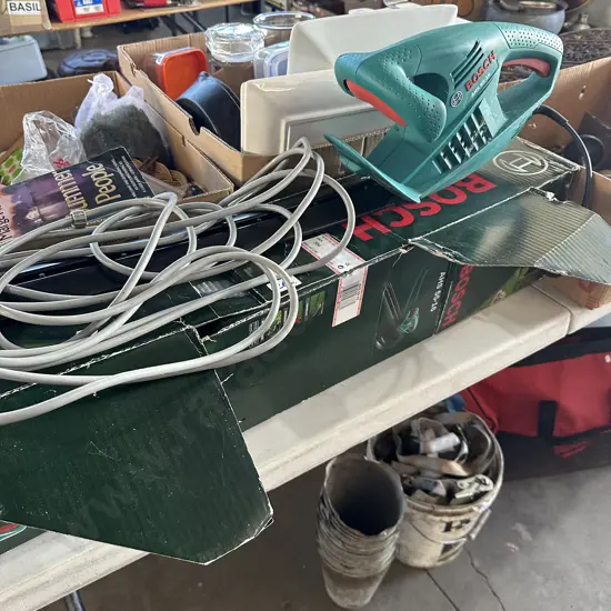 Boxed Bosch hedge trimmer and lead