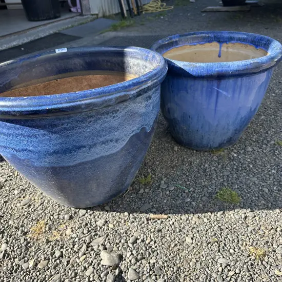 Two blue planters