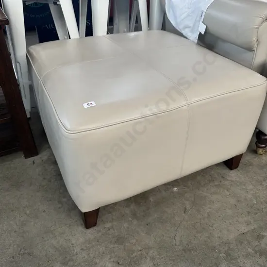 matching leather ottoman to the sofa