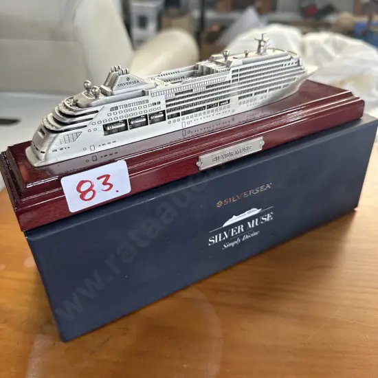 boxed silver muse model