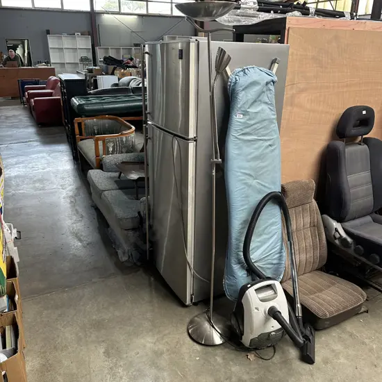 Vacuum cleaner, ironing board and lamp