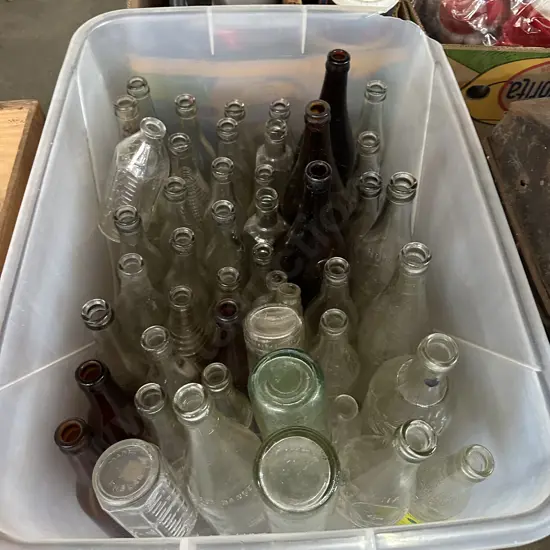 bin of vintage bottles