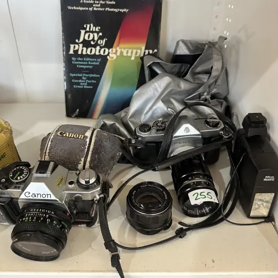 Canon and Pentax cameras, photography book etc.