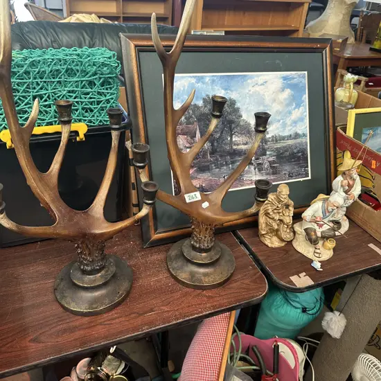 Candle holders, figures and picture.