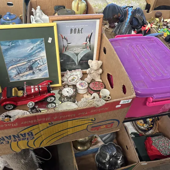 Box of collectables and lidded bin.