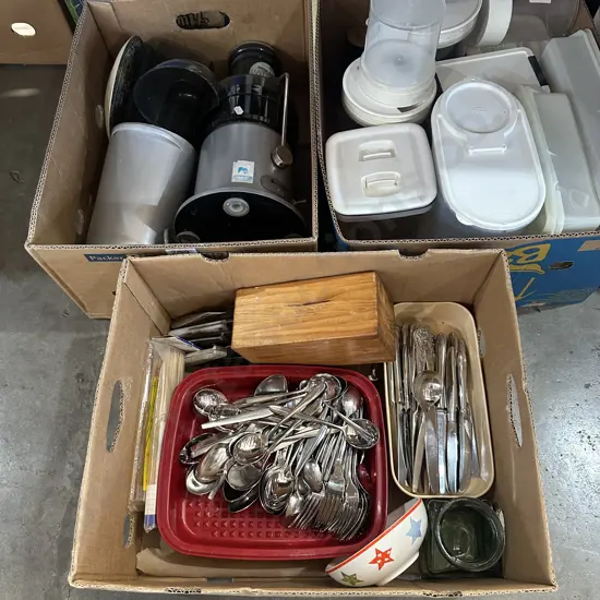 Three boxes cutlery, juicer and storage containers etc.