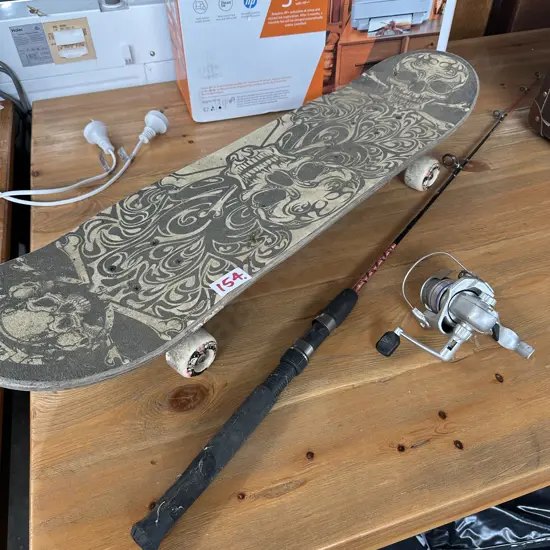 Skateboard and kids fishing rod and reel