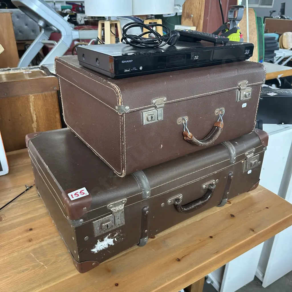 Two suitcases and Blu-ray disk player Image 1++