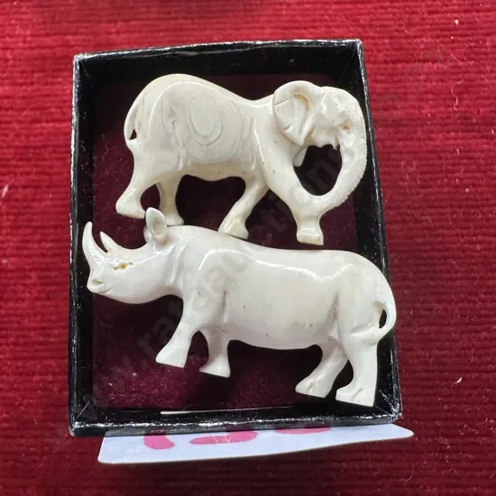 miniature ivory elephant and bone rhinoceros