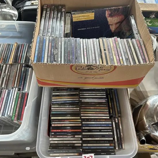 Bin and box of CDs and music DVDs