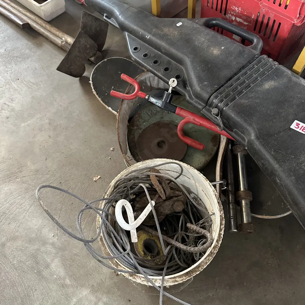 Large bay lot including skateboard, weights and gun case. (2 Photos) Image 1++