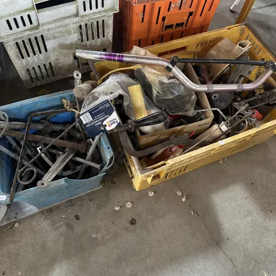 Large bay lot including skateboard, weights and gun case. (2 Photos)