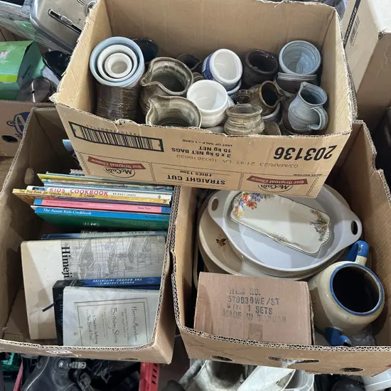 Three boxes pottery, cook books, enamel tea pot etc.