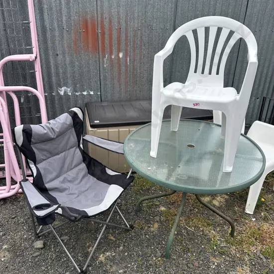 Round table and white plastic chair