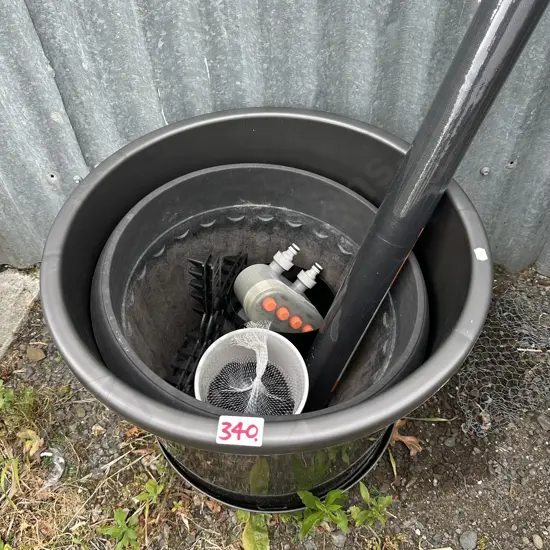 Large planters, weedmat, water timer etc.