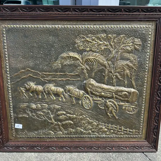 Colonial logging framed Brass art