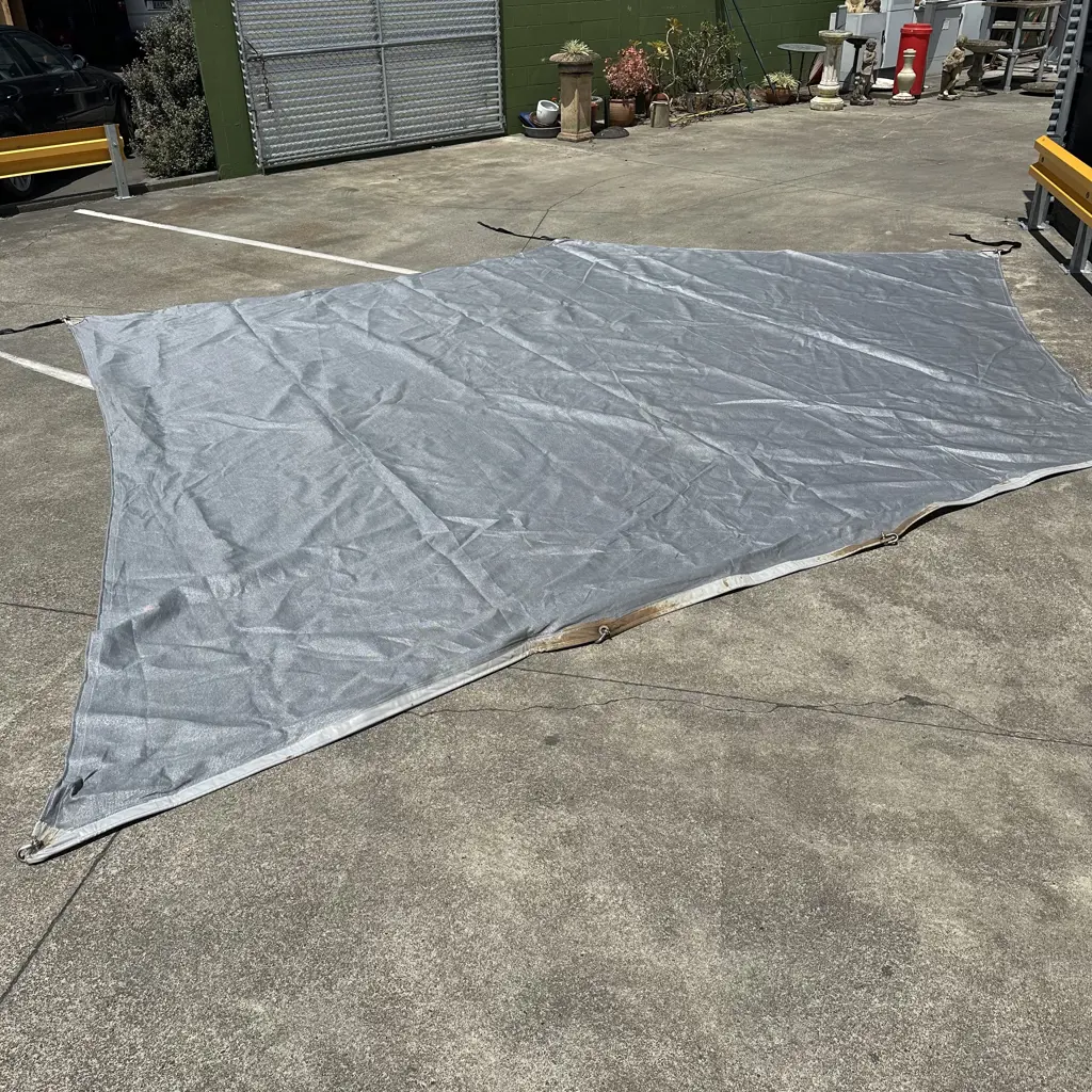 approx 6m x 4.3m shade sail plus stainless D bolts (no tears) Image 1++