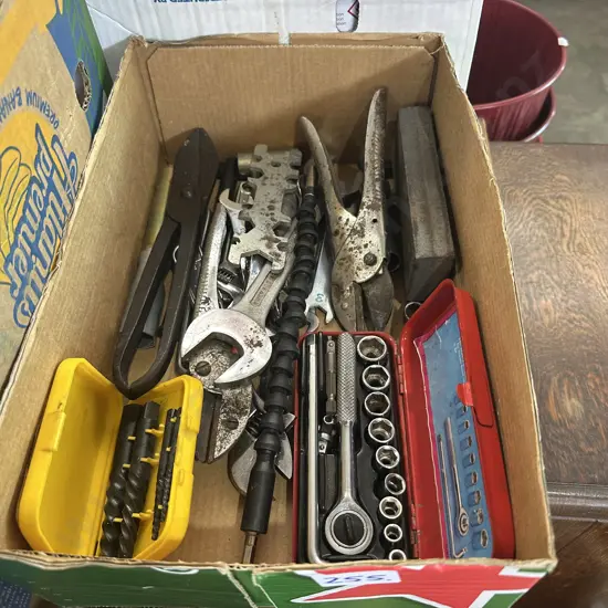 Tools including little socket set, screw extractor set.