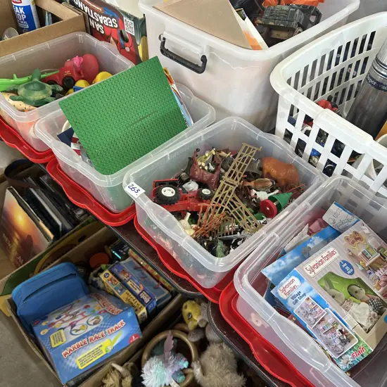 4 Lidded bins and toys.