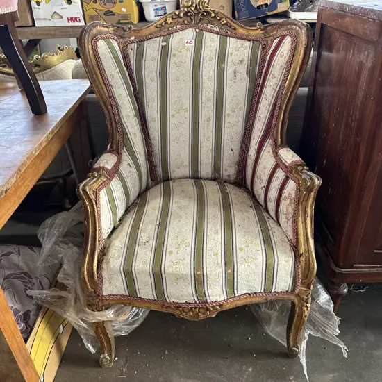 Regency stripe lounge chair needs TLC